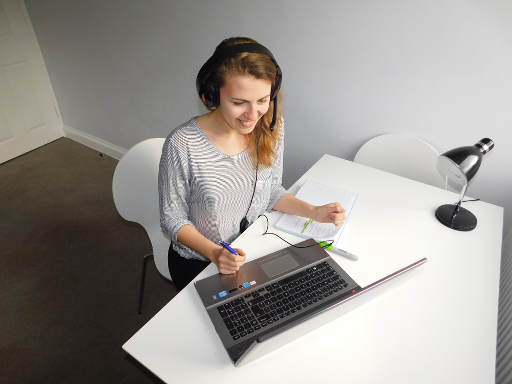 Picture of a lady using a laptop.